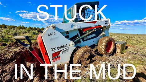 skid steer in muddy conditions|skid steer stuck in mud.